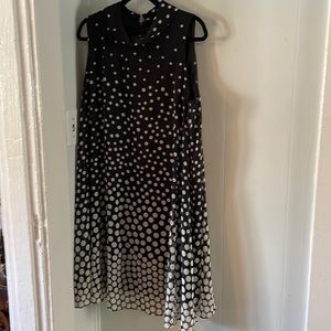 Stunning black and white polka dot dress. Only worn twice. Excellent condition.
